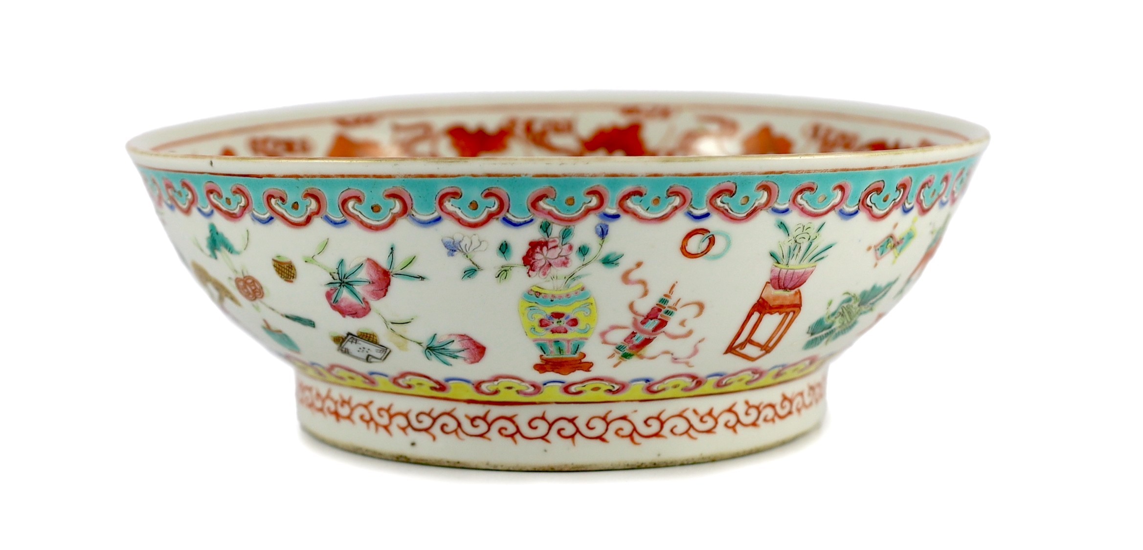 A Chinese famille rose ‘antiques and auspicious objects’ bowl, Chenghua mark, late 19th century, 26.7cm wide, mis-shapen